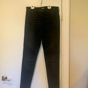DKNY black semi fitted stretch jeans with details at knees